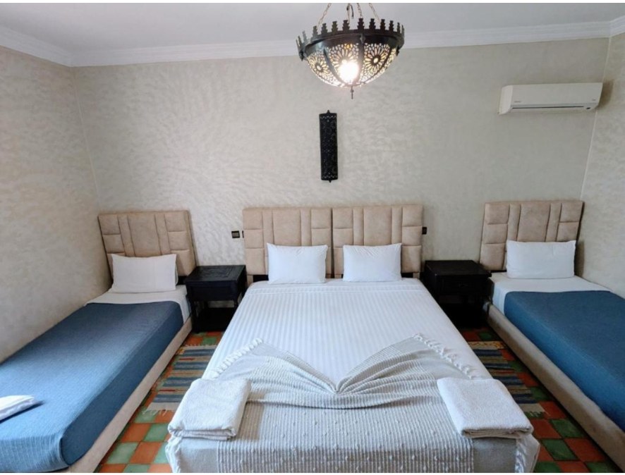 Chambre Familiale Supérieure — lits